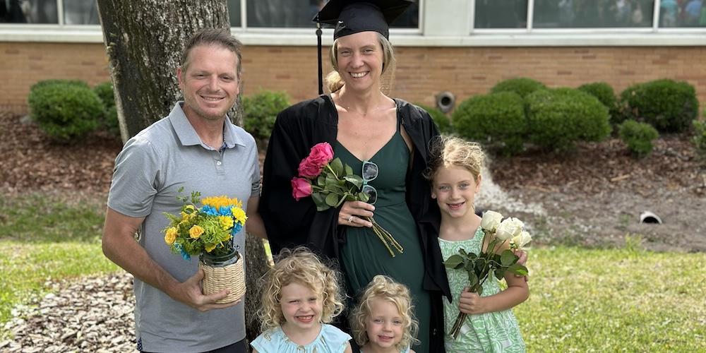 Kate with family at graduation