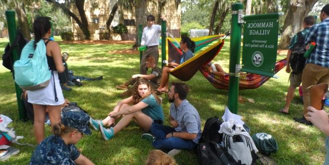 Students at Hammock Village spending time together outside.