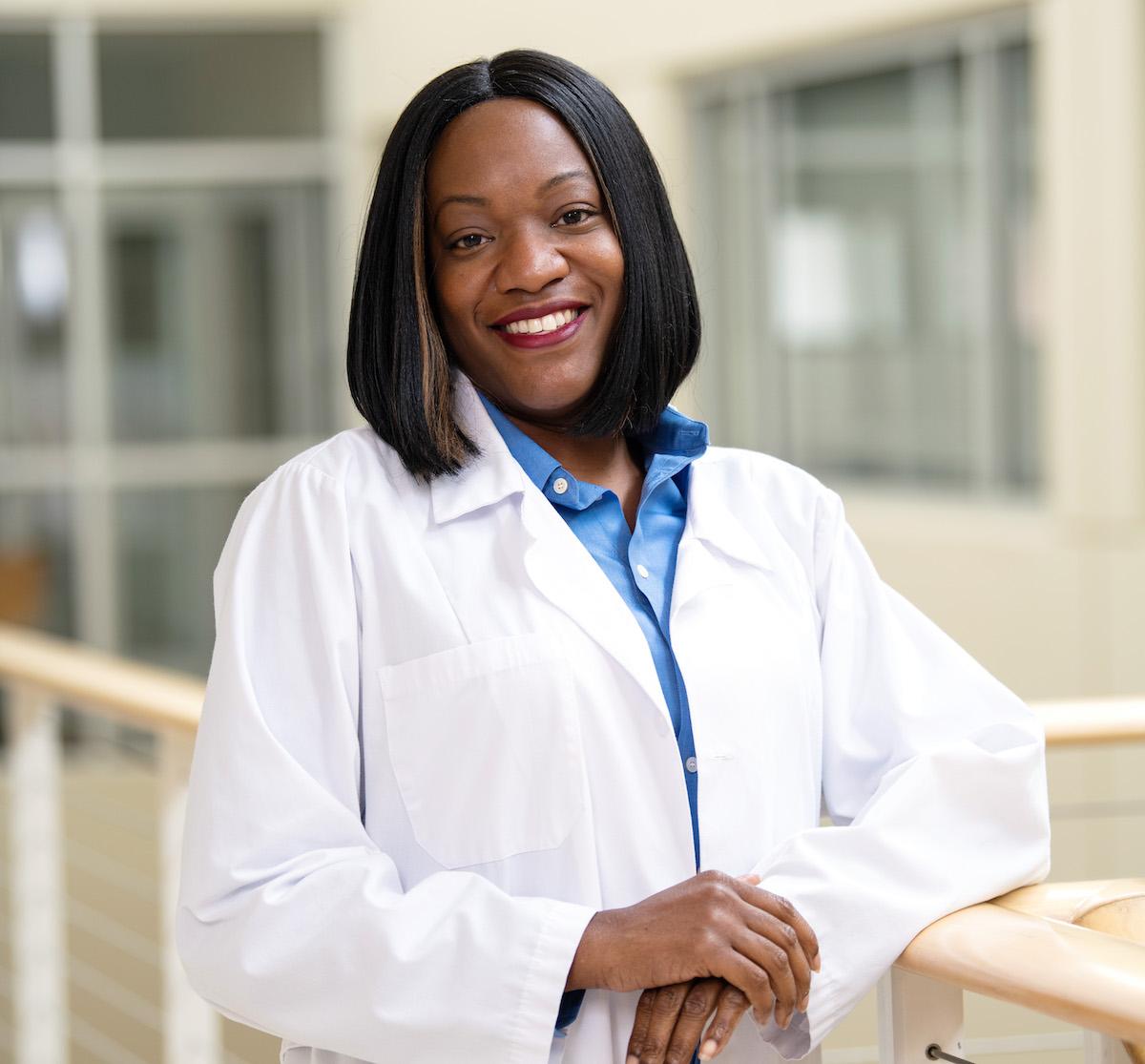 A nurse educator looking at the camera for a photo.